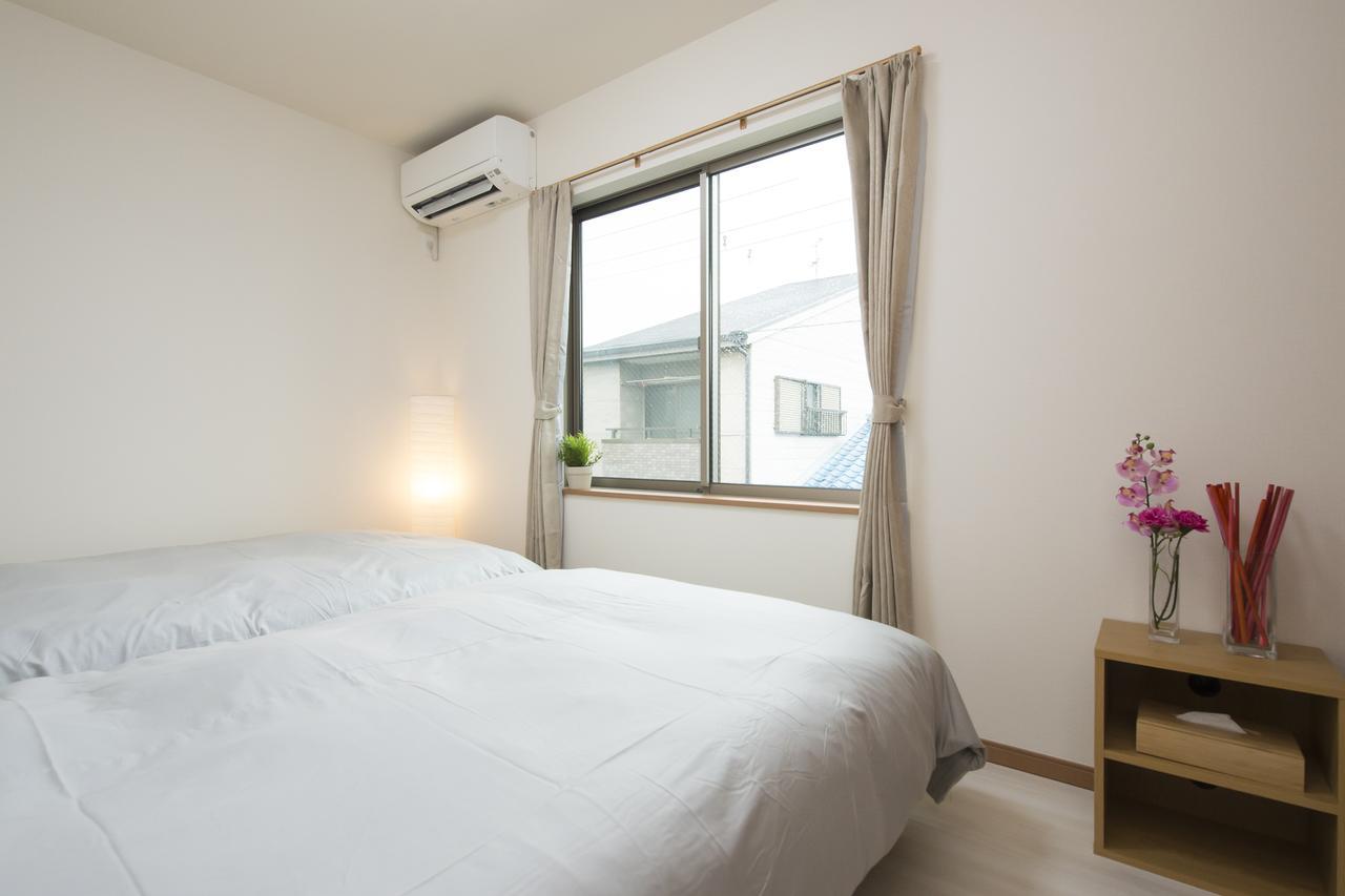 Kintai House Villa Osaka Buitenkant foto